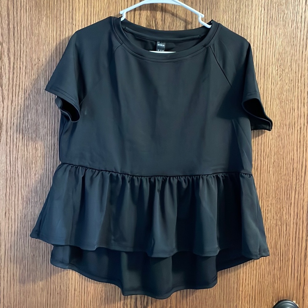 Black ruffle shirt